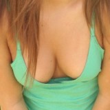 Lili likes letting guys look down her top to see her perky tits